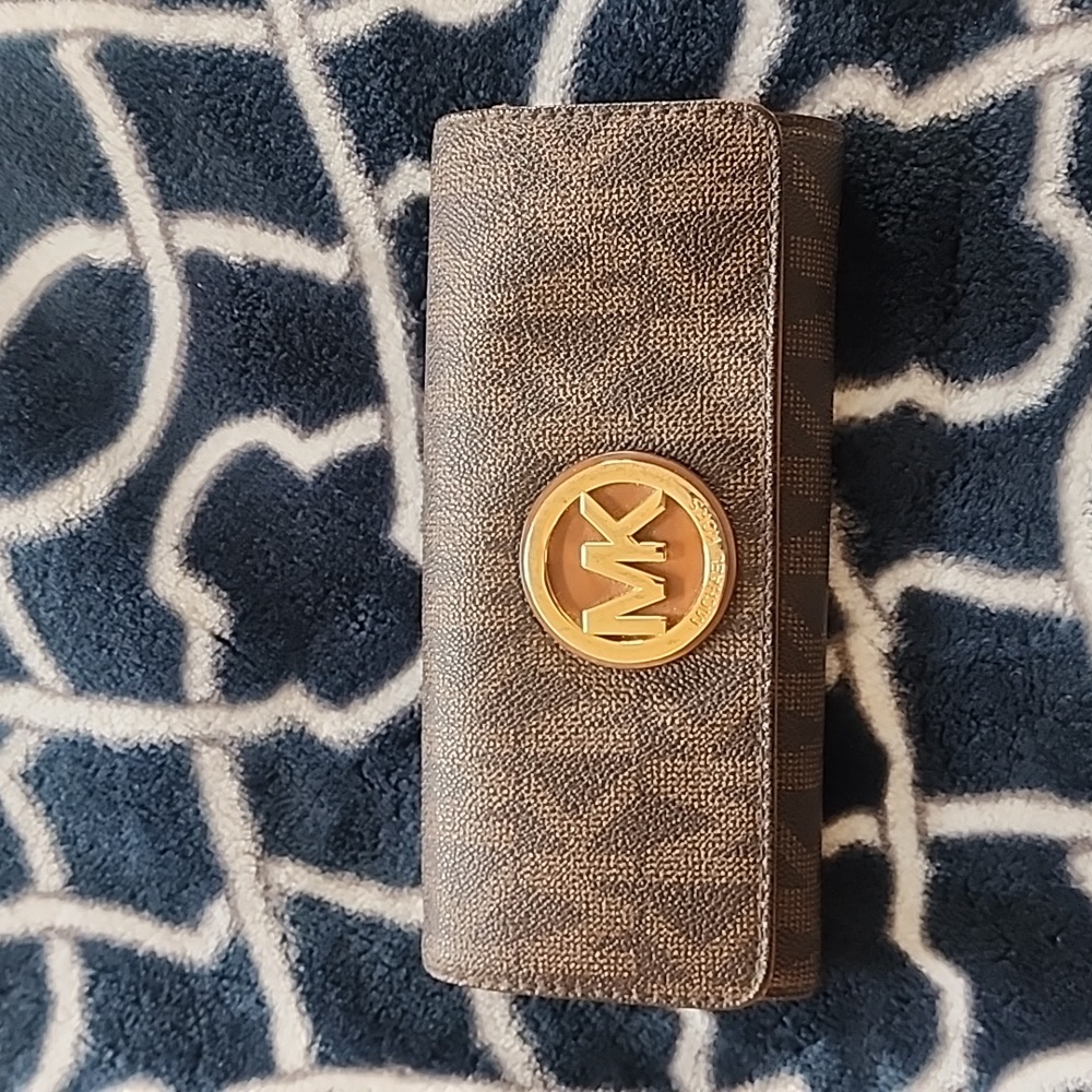 MK trifold wallet.